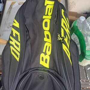 Brand: Babolat Model: Pure Aero Backpack Color: Black and Yellow Capacity: Appro